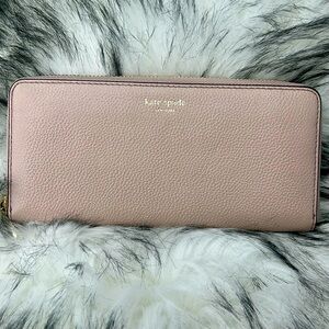 Kate Spade pale blush pink zip around wallet, burgundy interior, EUC